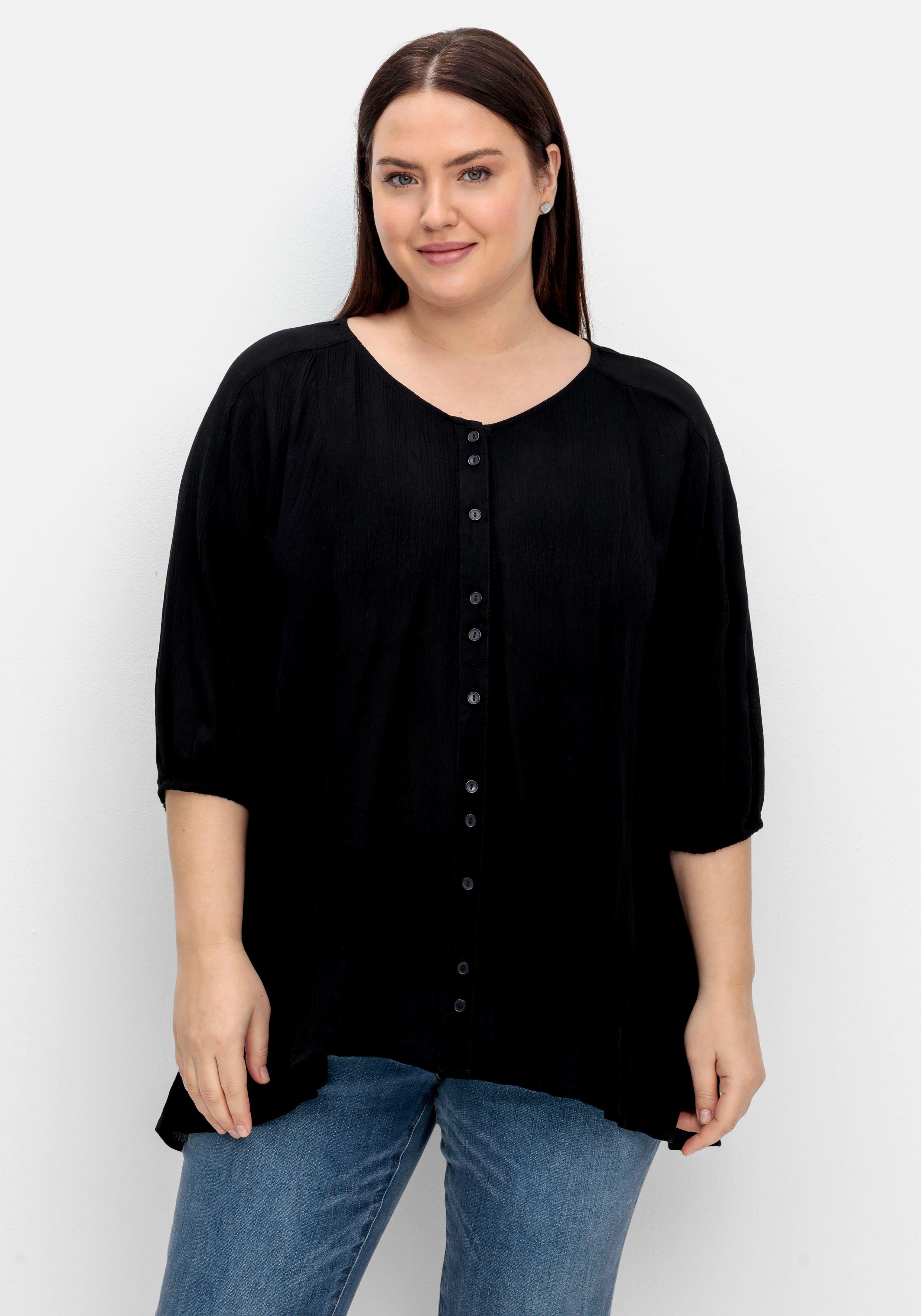 Bluse aus Crêpe, mit Volants am Saum