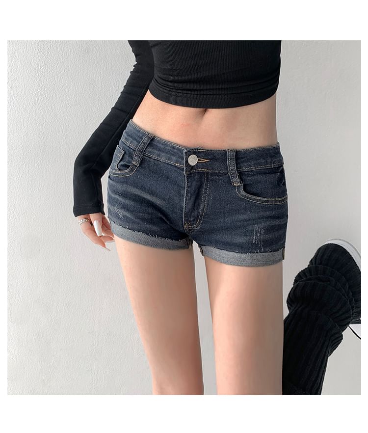 Shira - Denim shorts met lage taille en opgerolde zoom