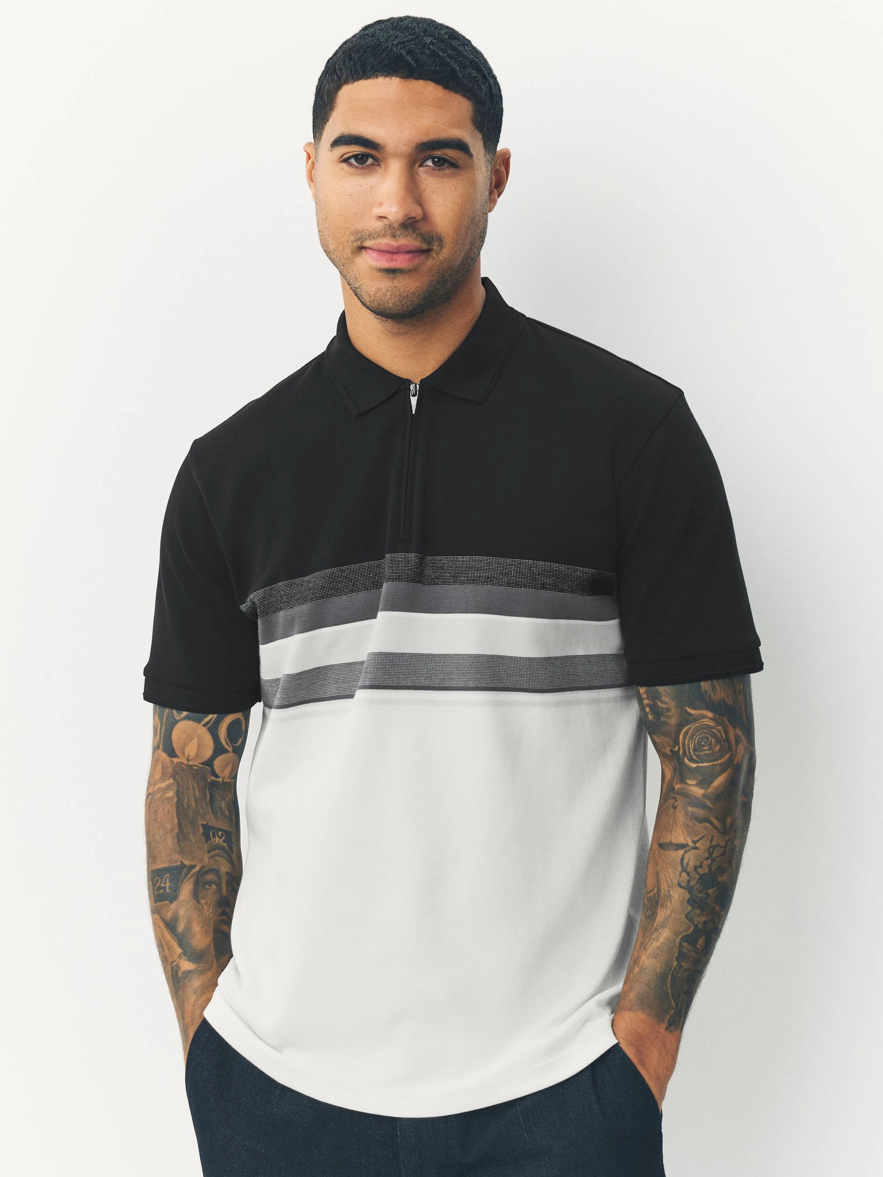 Zwart/wit - 100% katoenen poloshirt met korte mouwen, rits bij de hals en kleurvlakken