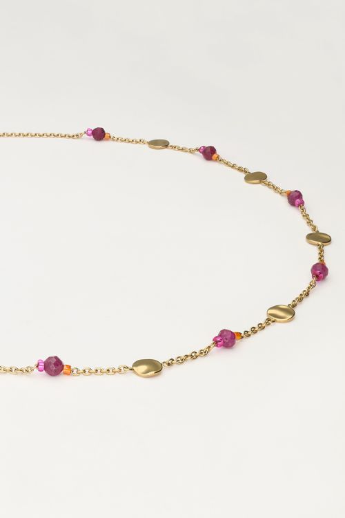 Ketting met munt en paarse kralen