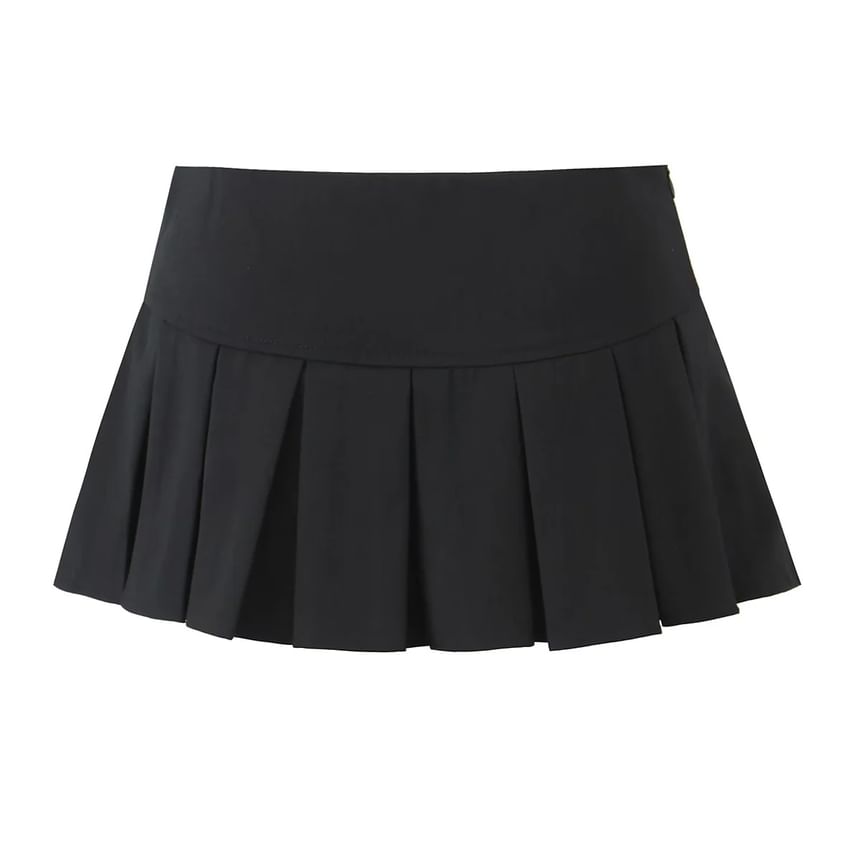 Asiris - Laag uitgesneden geplooide rok met strikaccent