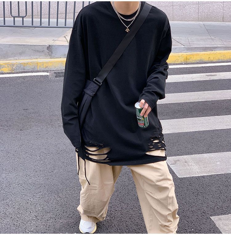 Whyessa - Versleten oversized top met lange mouwen