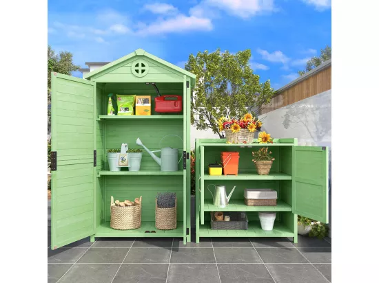 Abri de jardin en bois traité comprenant une grande cabane à outils et deux petits modules de stockage couleur vert nature