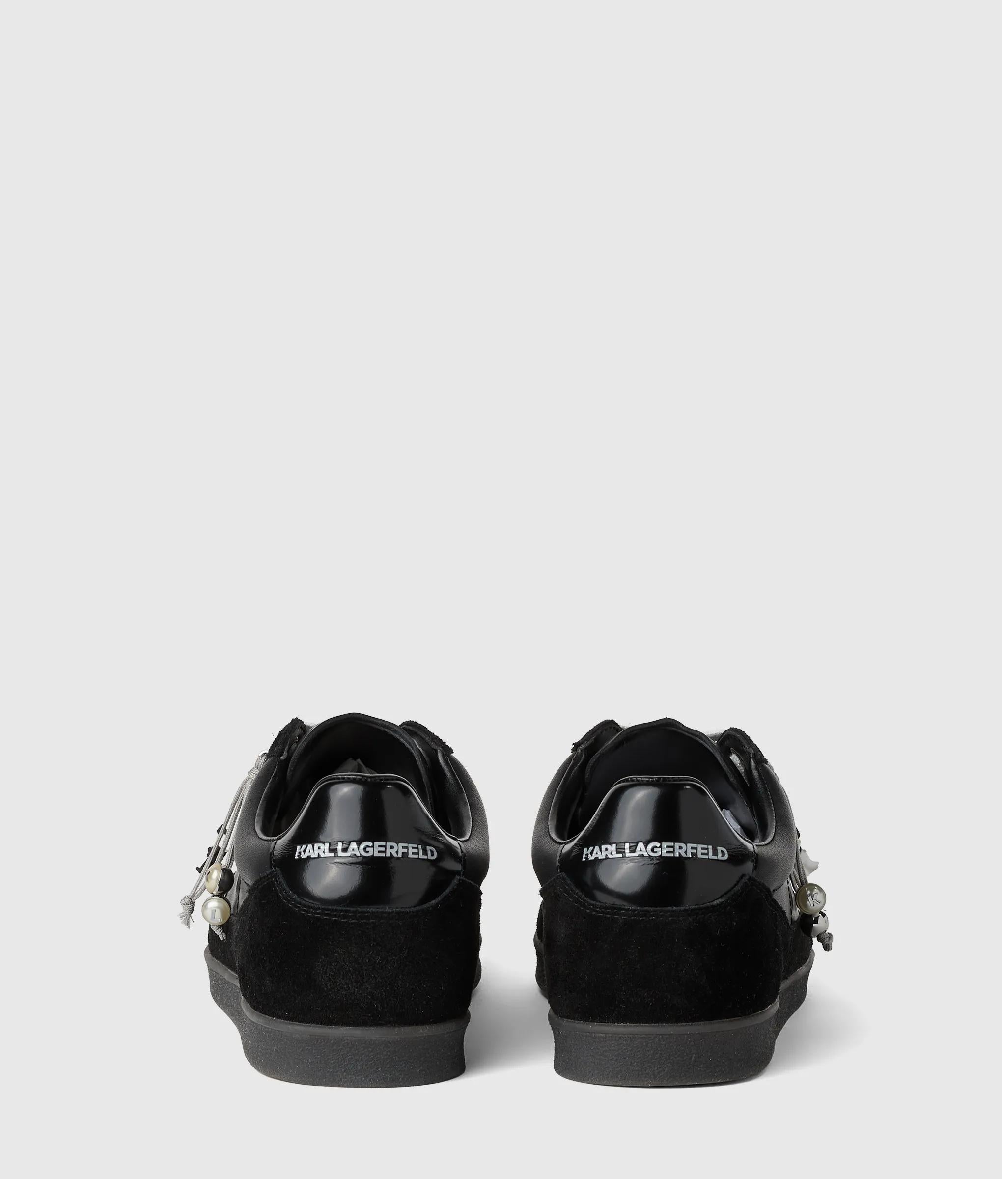 Kandidate sneakers met Ikon-bedels