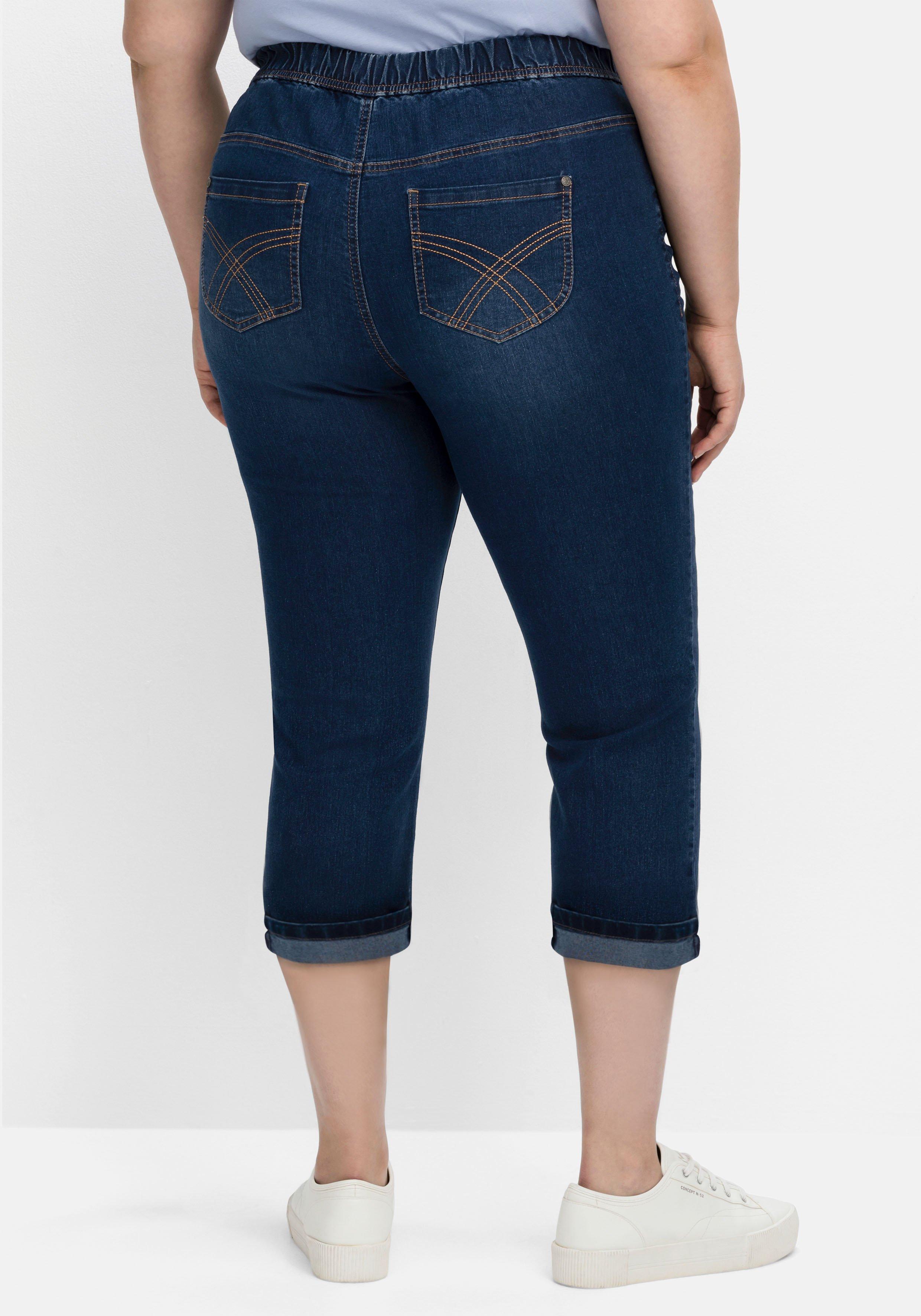 Schmale Caprijeans mit Saumumschlag