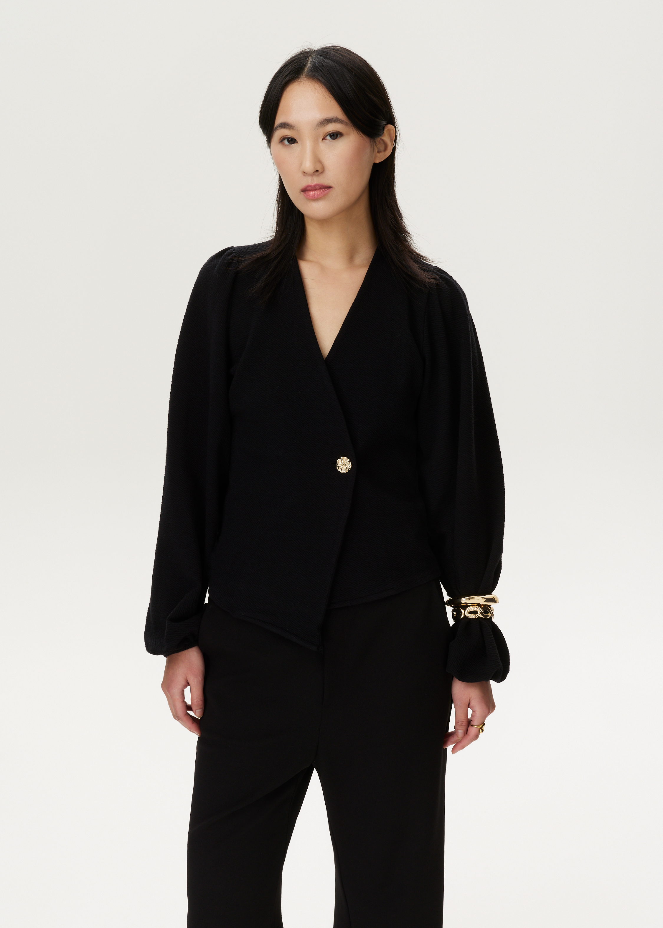 Top met asymmetrisch detail