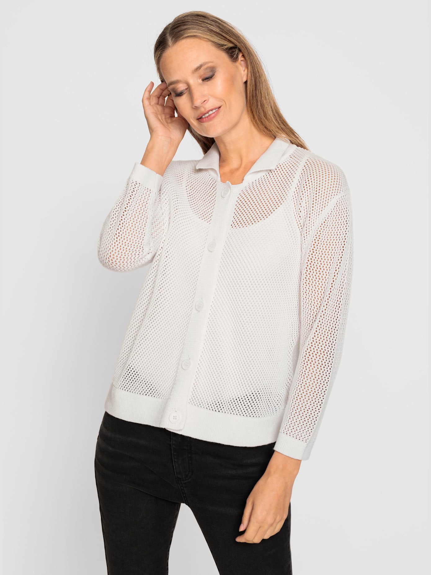 Veste en tricot motif ajouré transparent discret