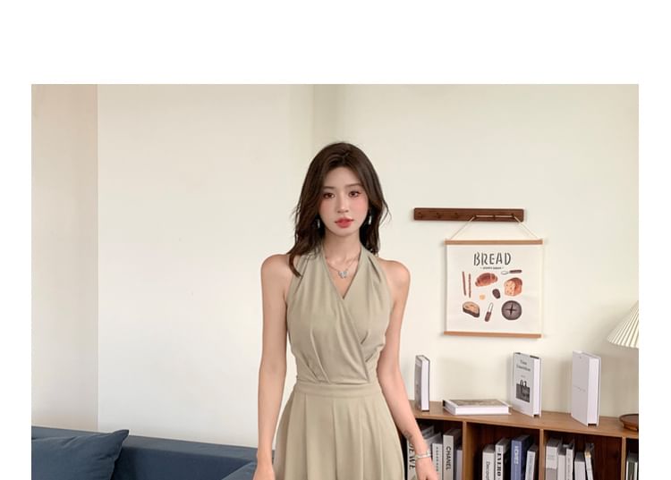 Arabesquito - Mouwloze V-hals jumpsuit met wijde pijpen