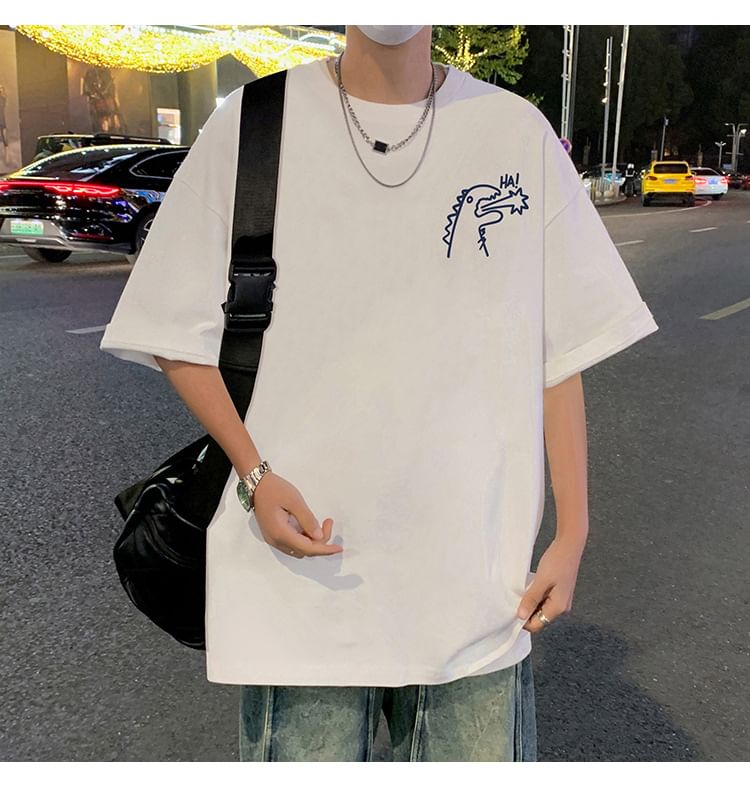 Wolfkane - Oversized T-shirt met korte mouwen, ronde hals en dinosaurusprint