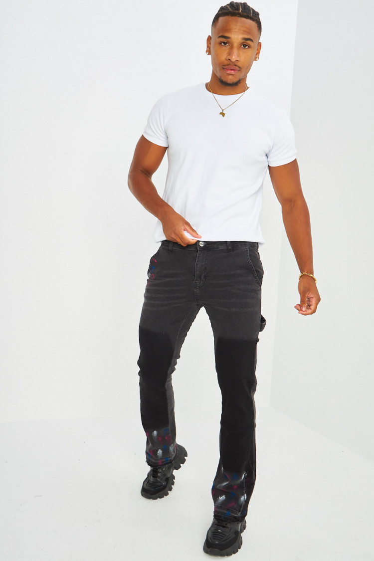 Jeans coupe droite noir avec taches de peinture
