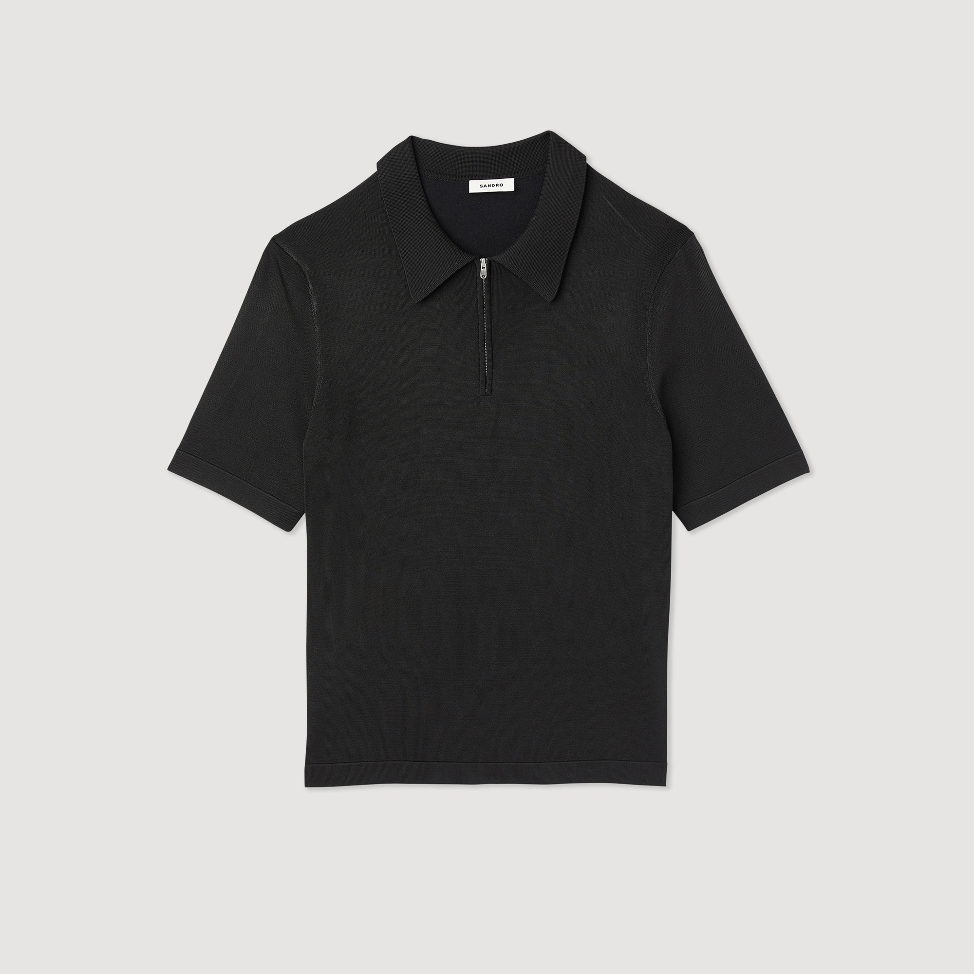 Polo en maille á col zippe