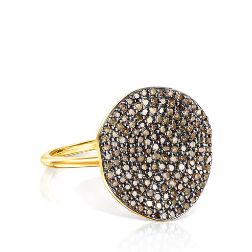 Anel grande com banho de ouro 18k sobre prata e diamantes em formato de lírio d'água.