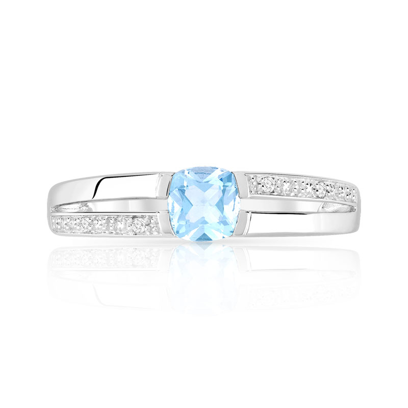 Bague or 375 blanc topaze bleue traitée et diamants