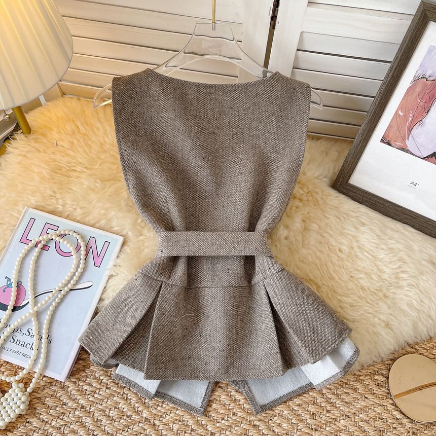 Lucuna - Peplum-vest met ronde hals en knoopjes