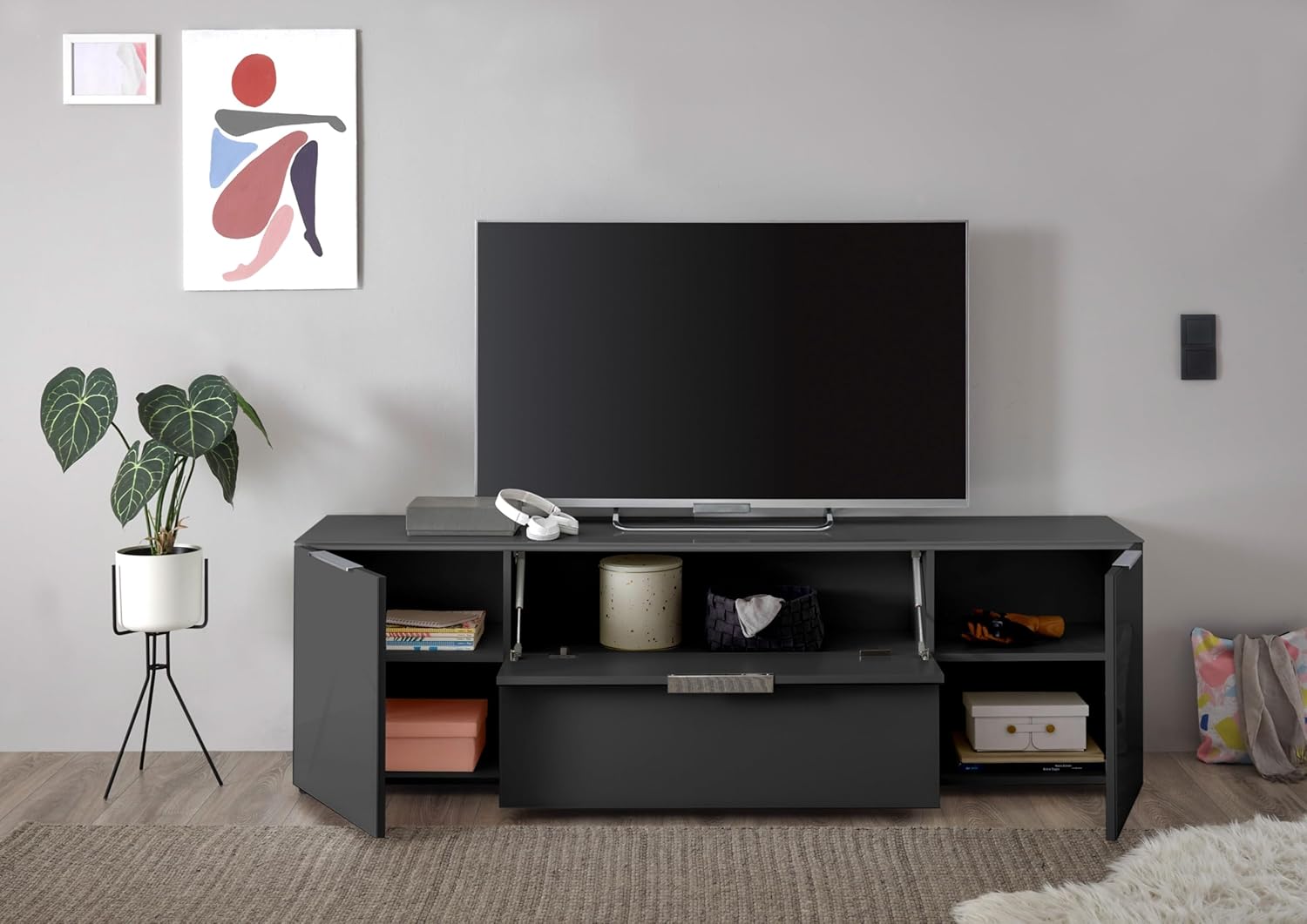 Stella Trading TV-Lowboard Santorin in Anthrazit, TV - TV Schrank für TV bis 65 Zoll mit viel Stauraum für Ihr Wohnzimmer - 180 x 55 x 40 cm (B/H/T)