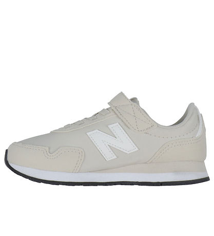 New Balance Schuhe - 323 - Timberwolf/Sea Salt