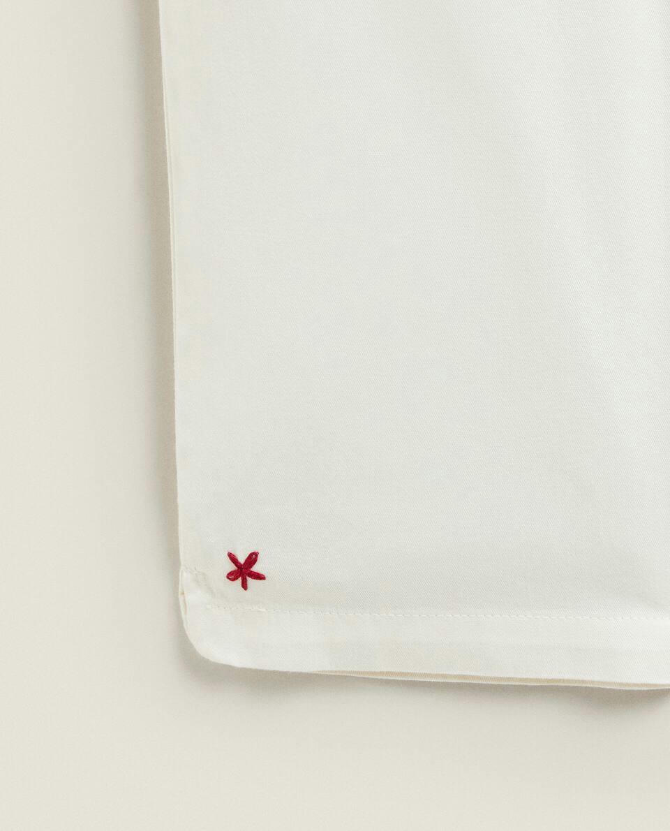 Conjunto de pijama de Natal infantil com gola bordada