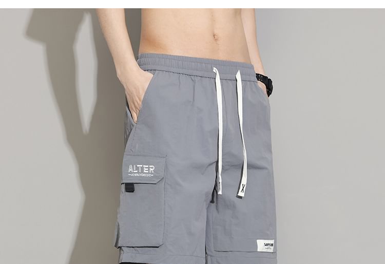 Cowpow - Cargoshorts met middelhoge taille en letters