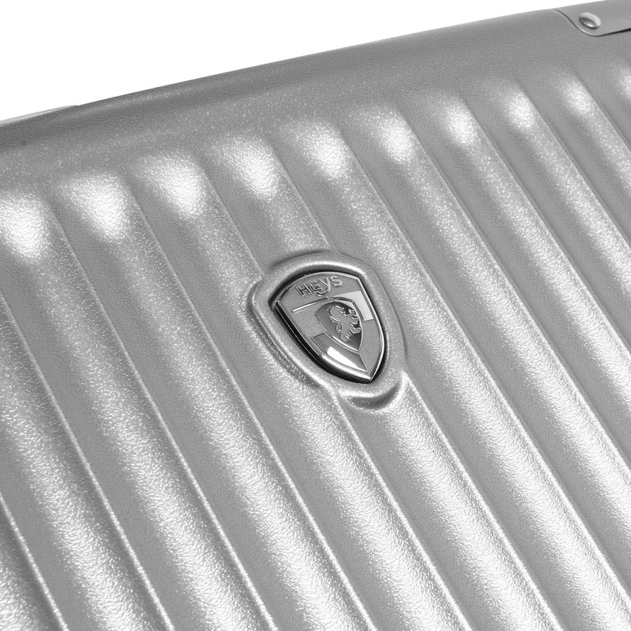 Heys Luxe Trunk - 4-Rollen-Trolley 76 cm erw. silver