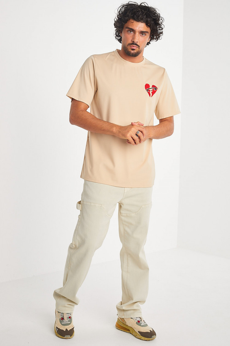 T-shirt beige coeur brisé
