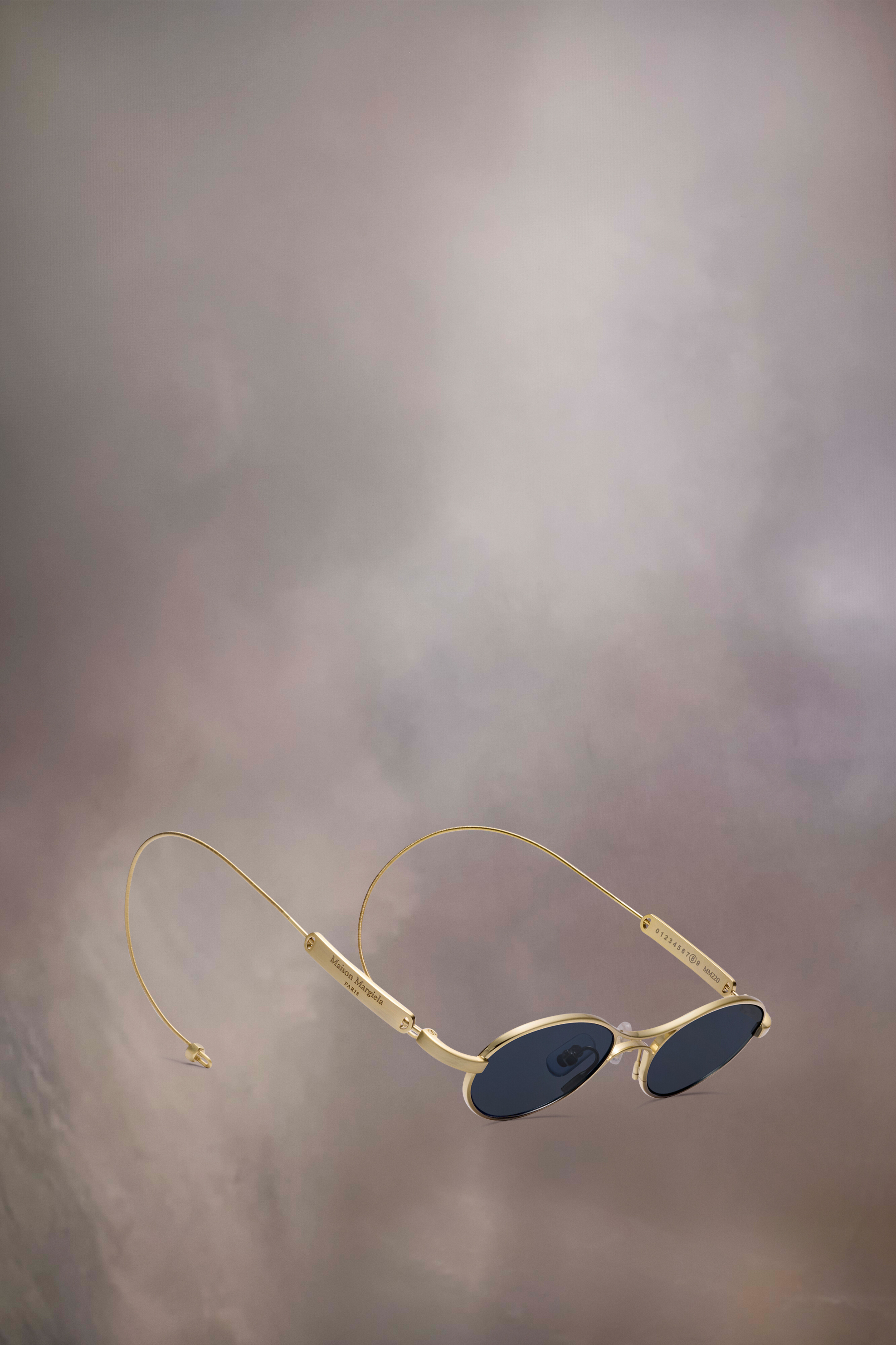 Lunettes de soleil ovales dorées x Gentle Monster​