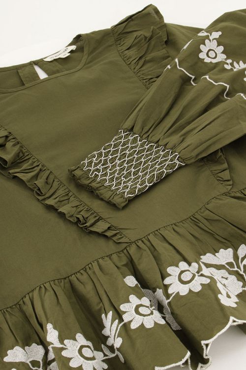 Donkergroene top met witte embroidery