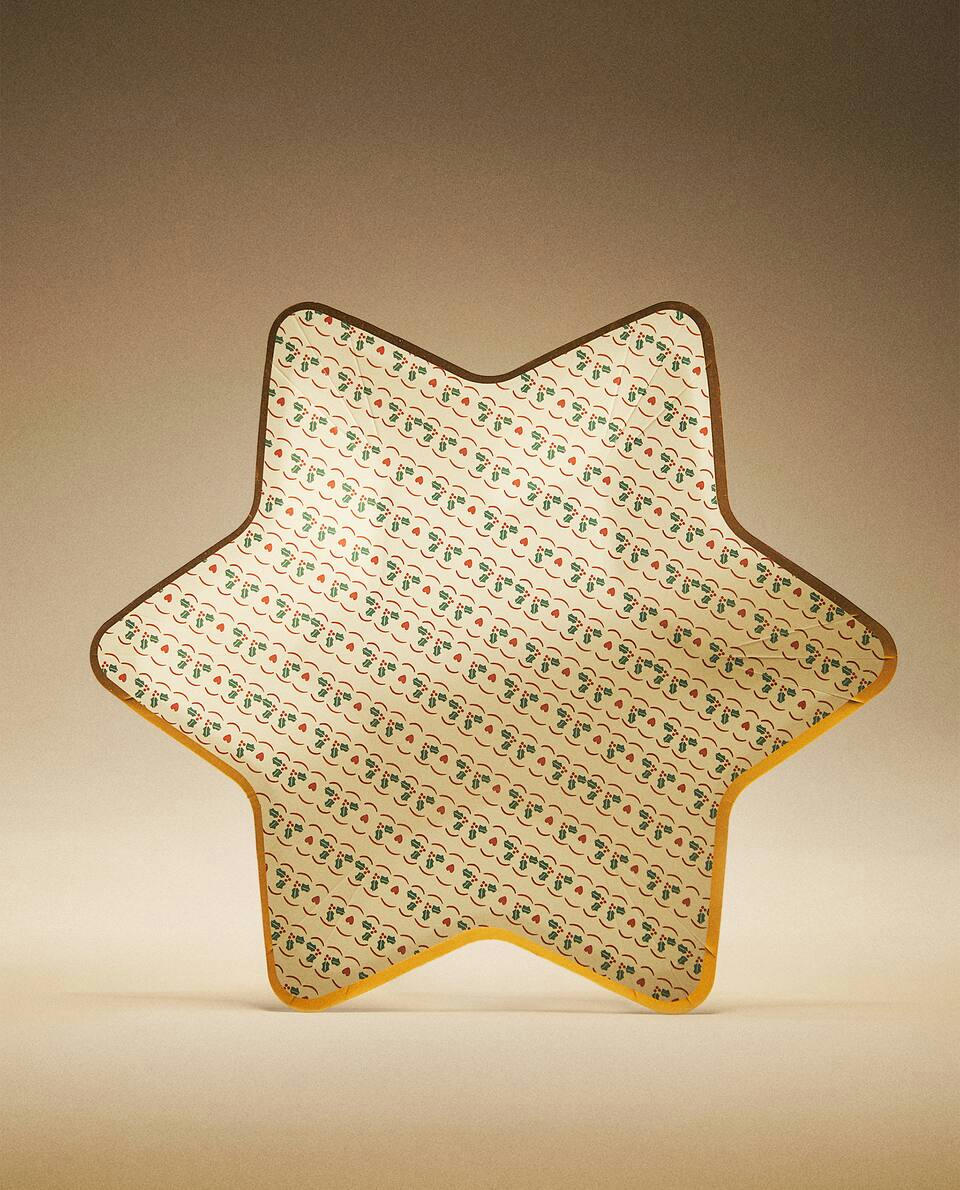 Pacote com 12 pratos de papel infantis em formato de estrela de Natal.