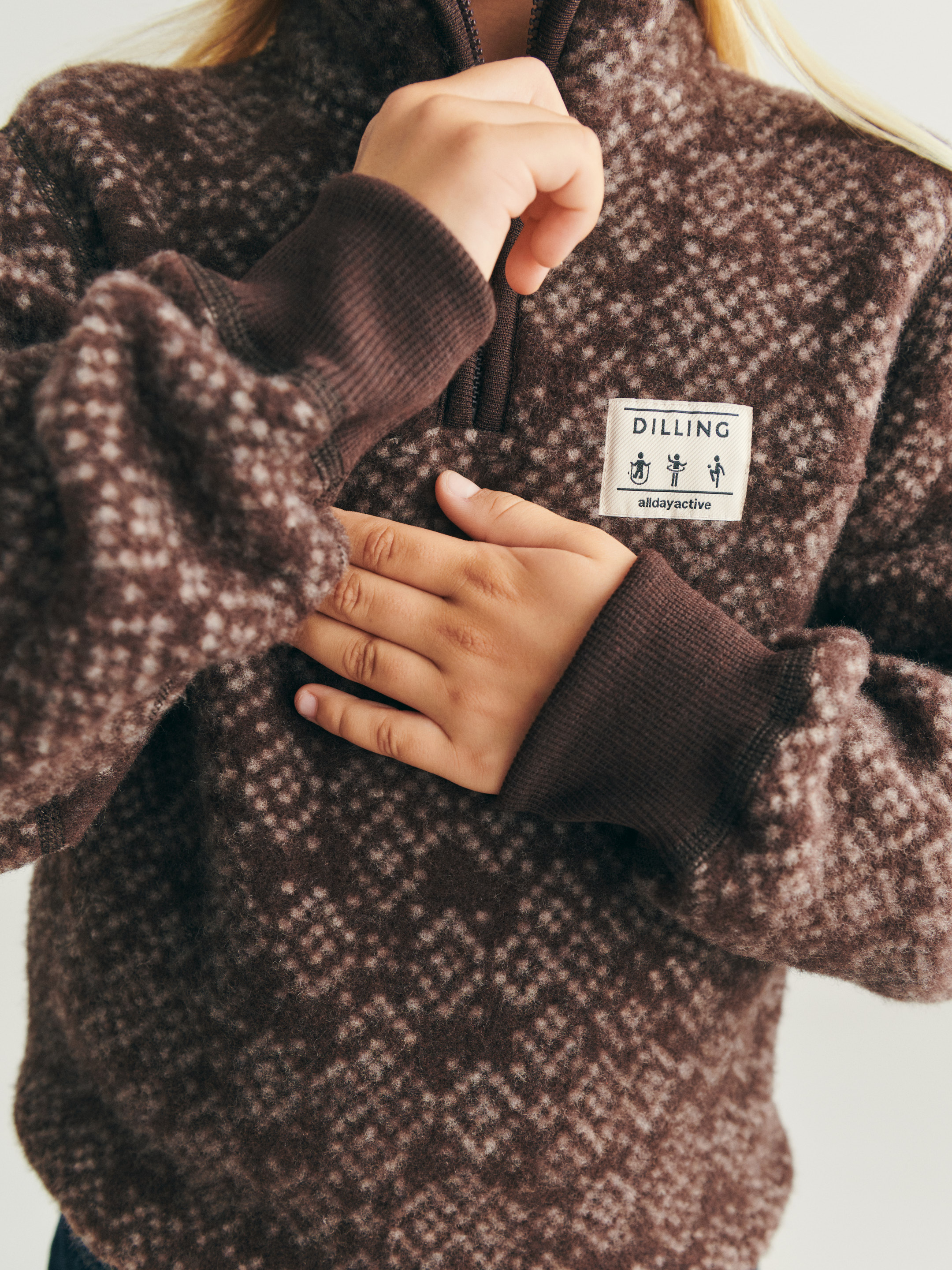Vest in fleece van merinowol, met halve rits voor kinderen