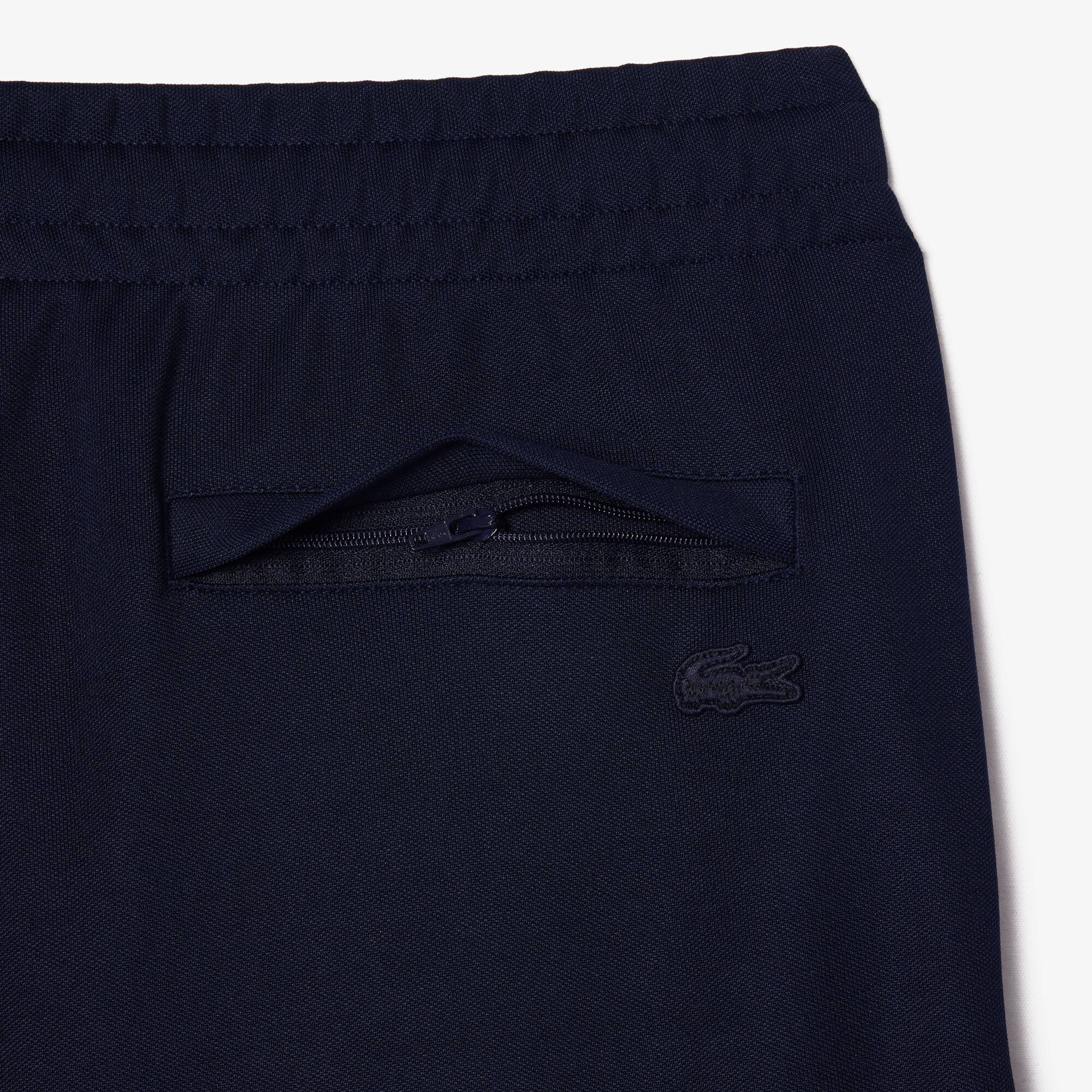 Trainingshose im lockeren Schnitt aus Interlock Trainingshosen - Blau - Lacoste - Herren