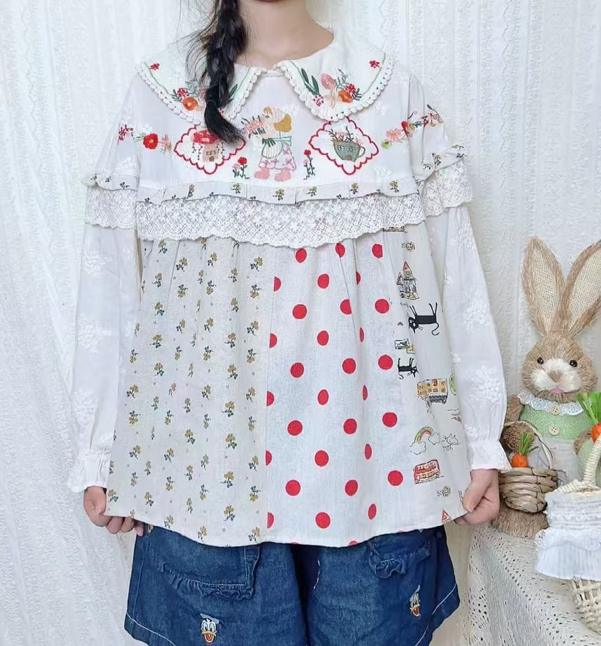 Aigan - Blouse met pofmouwen en kantversiering