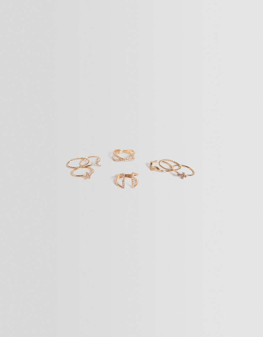 Conjunto de 8 anéis em forma de cruz com strass e lua