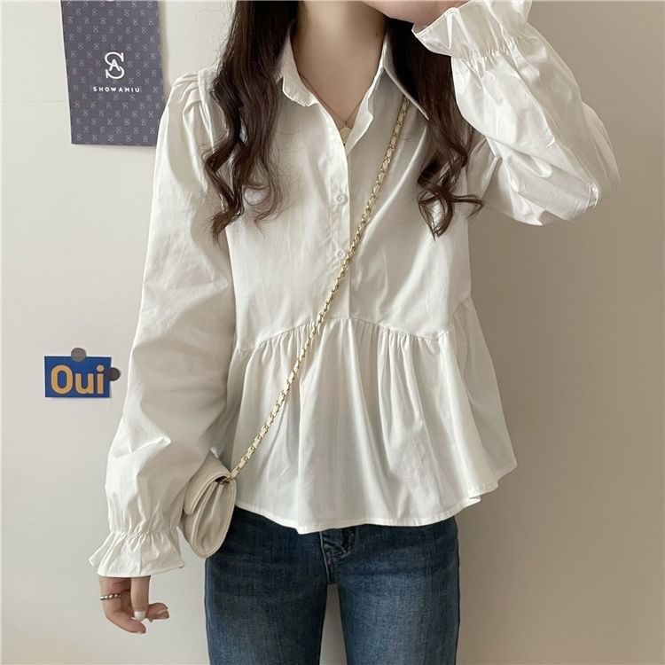 Sisyphi - Blouse met pofmouwen en knoopjes