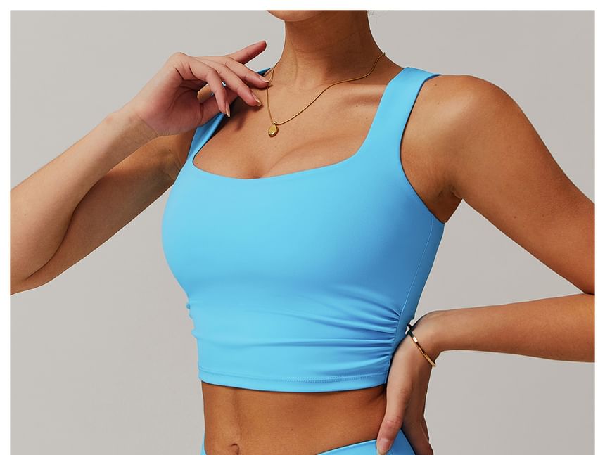 Skinniano - Sporttop met vierkante hals en effen crop top