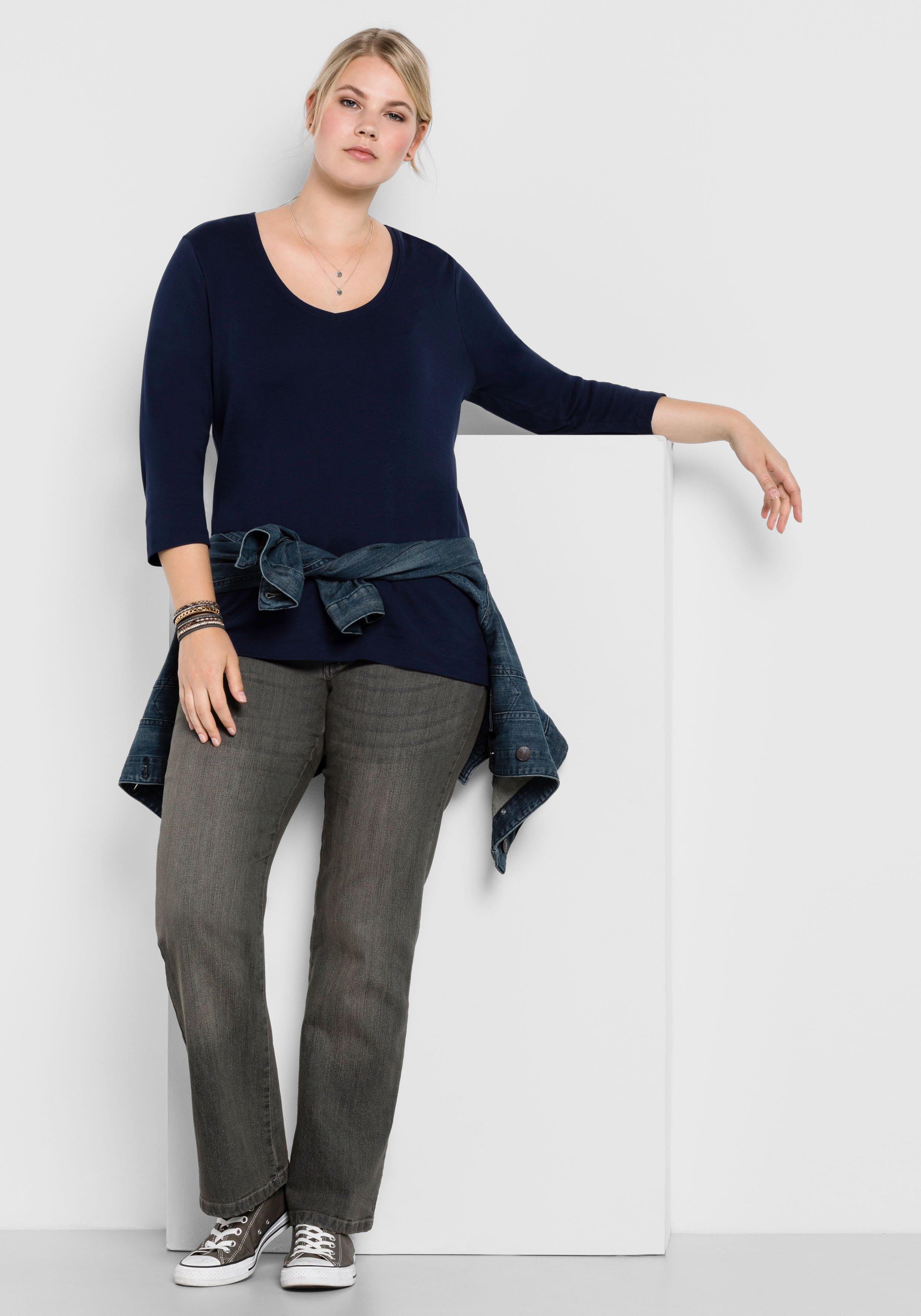 Bootcut-Jeans in 5-Pocket-Form, mit Used-Effekten