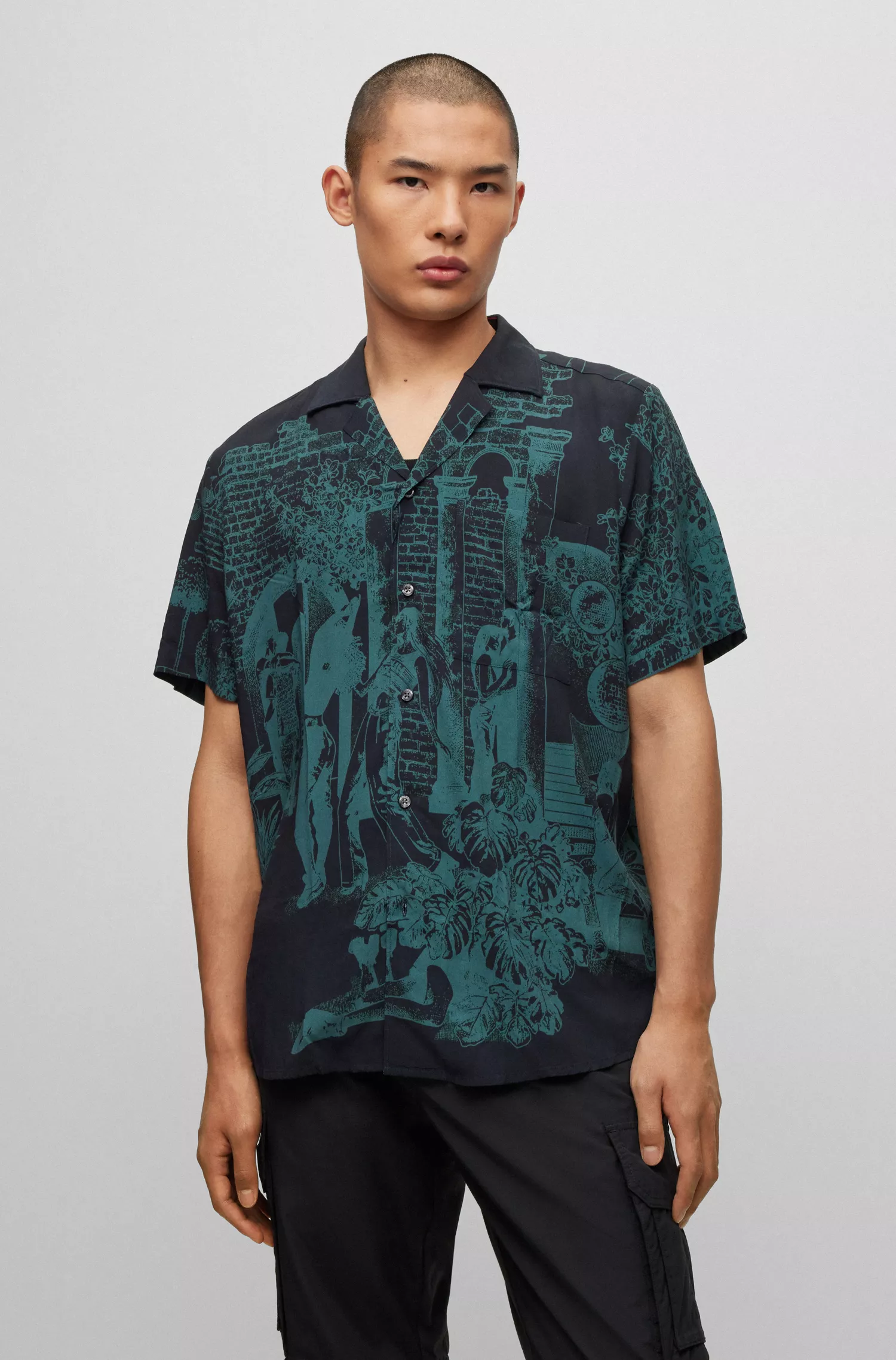 Camisa HUGO vermelha de corte relaxado com estampa sazonal por toda a peça.