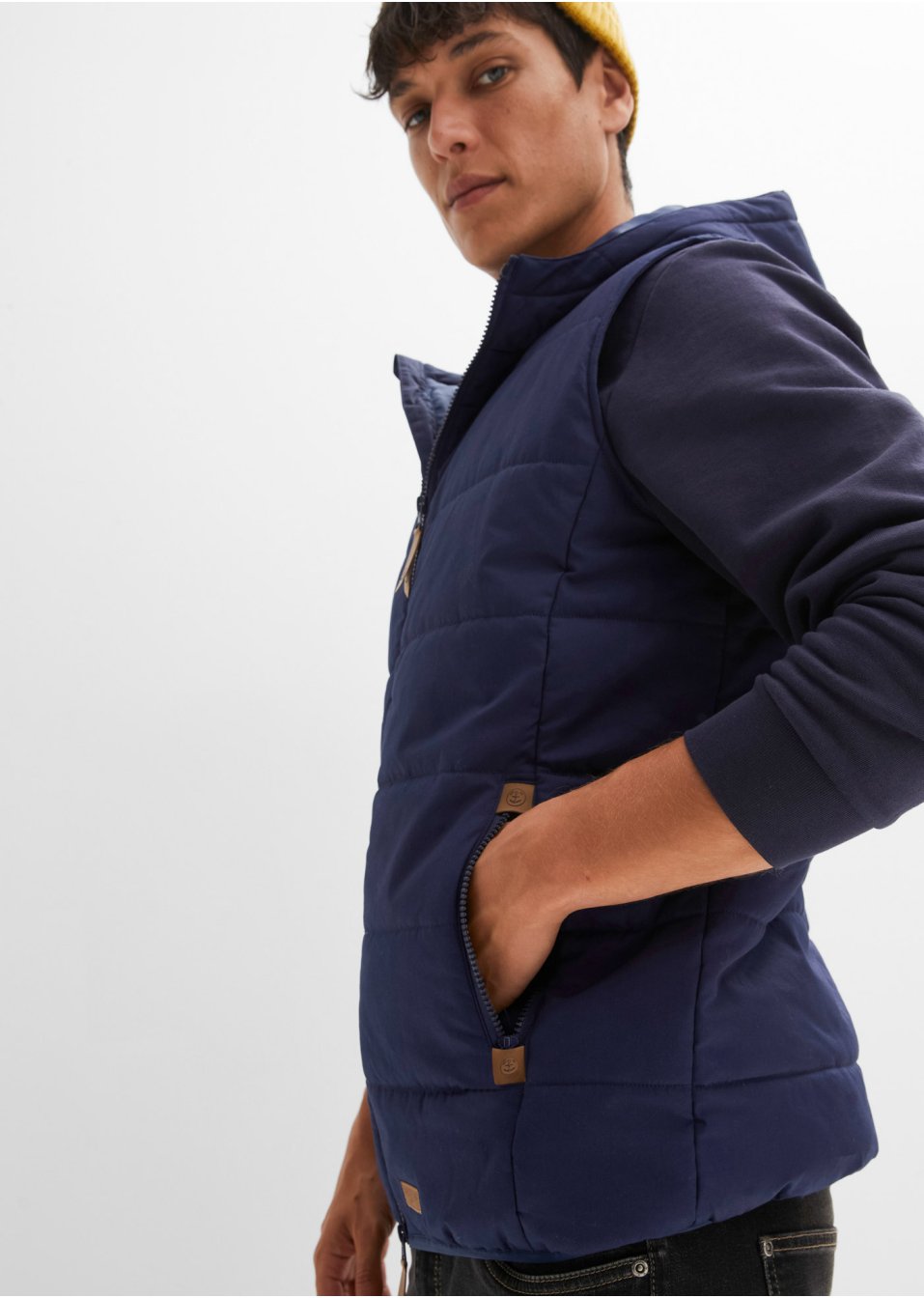 Veste sans manches matelassée à capuche
