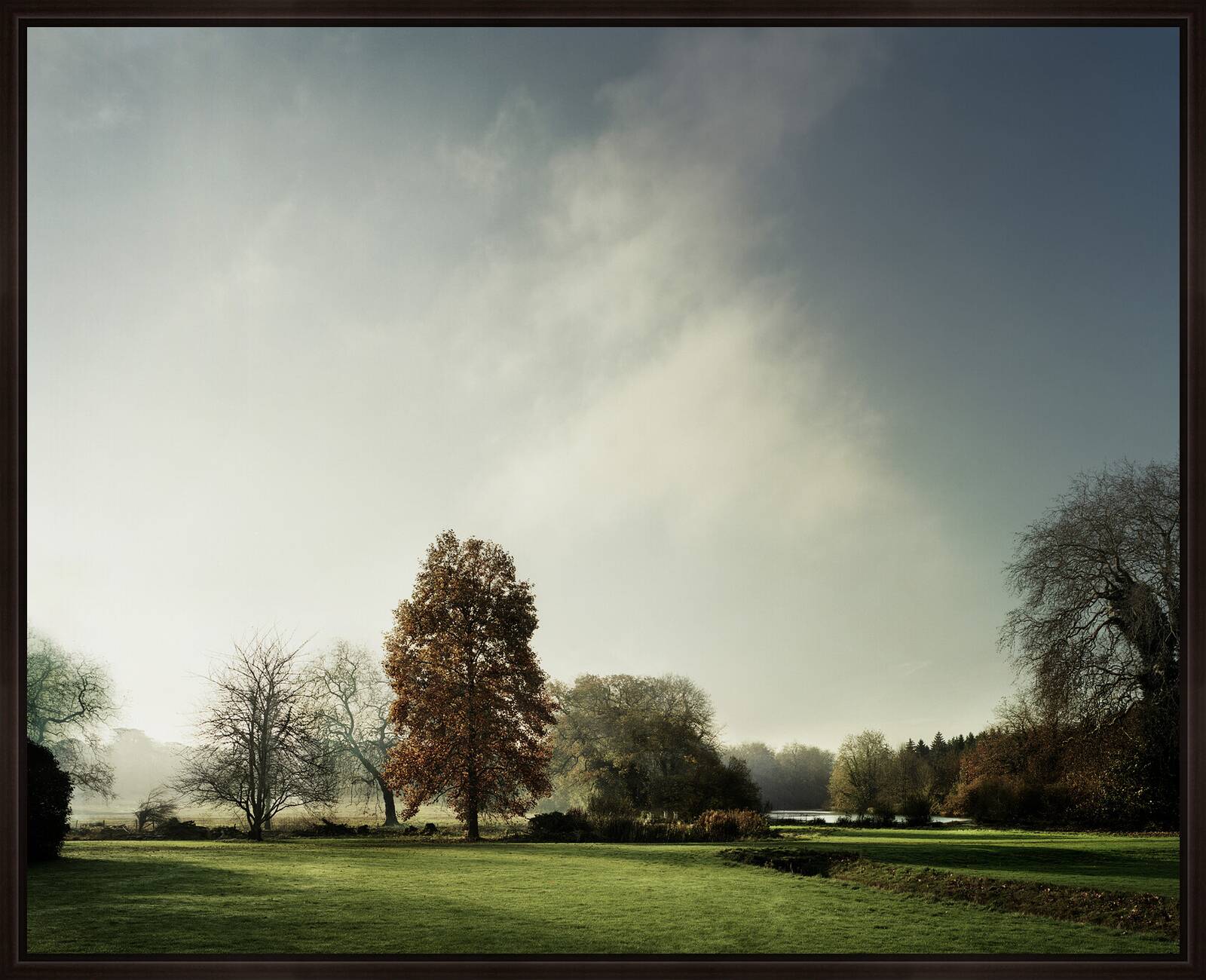 View of the lake in Autumn on St Giles House Park by Justin Barton - Limited Edition. Edition of: 150. Signed.