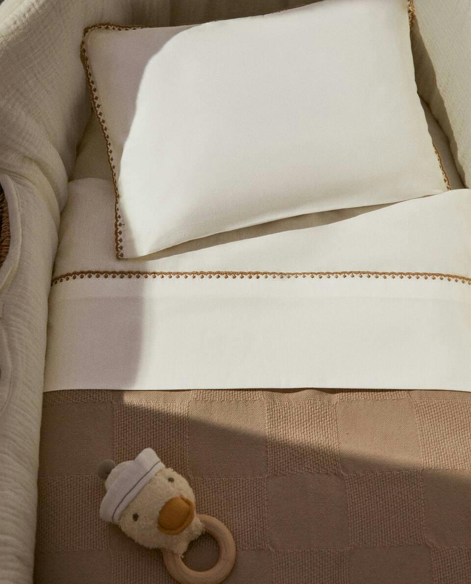 Conjunto de lençol de cima e fronha com costura decorativa