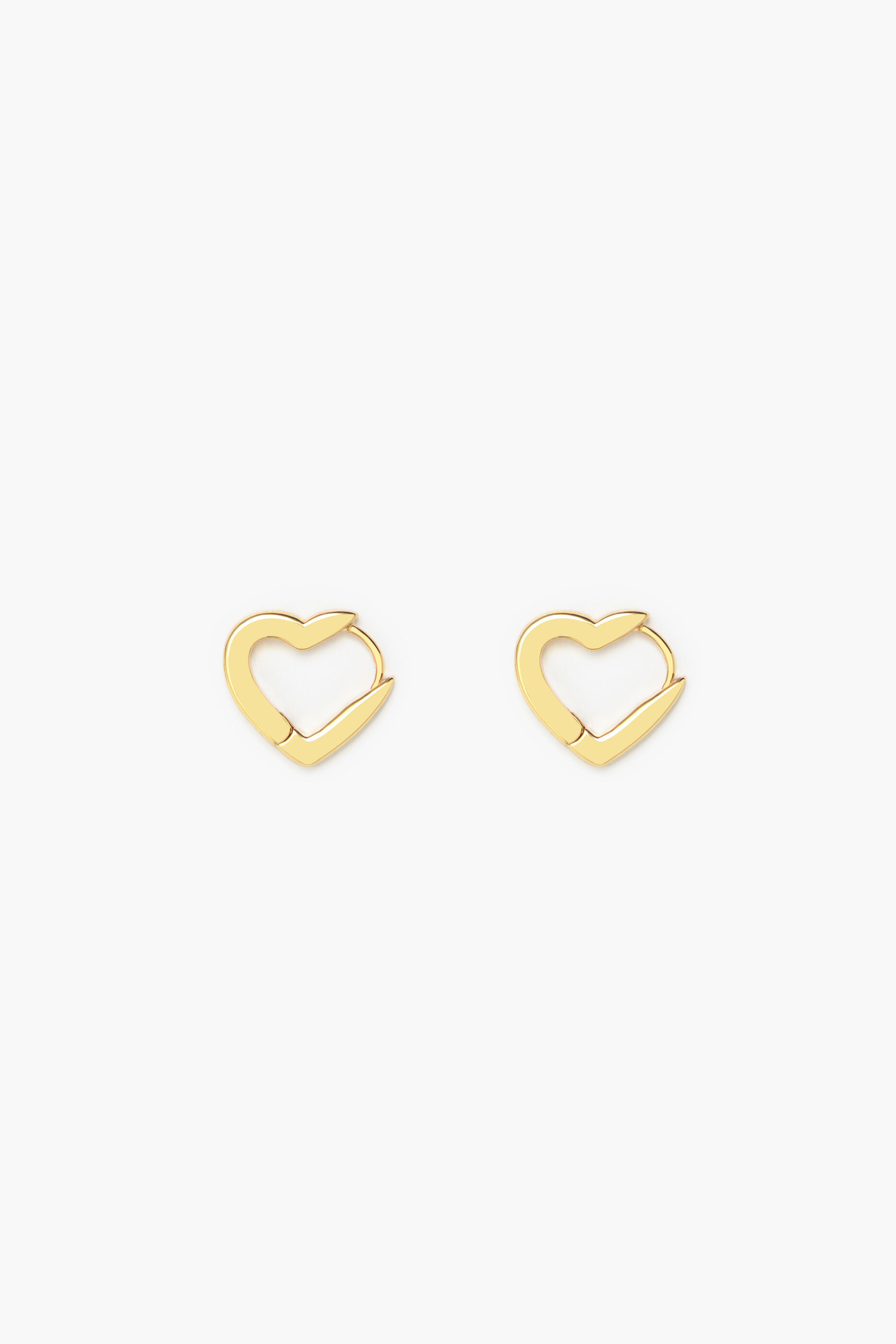 Brincos de argola em formato de coração dourado