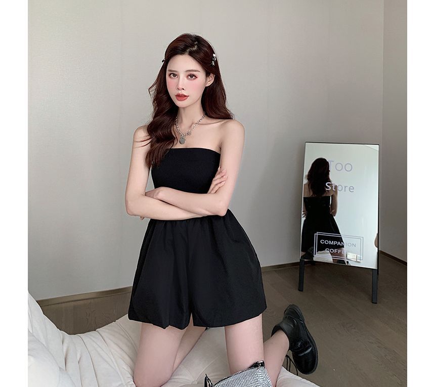 Cerauno - Strapless romper met wijde pijpen