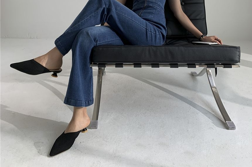 SisLinda - Mouwloze halternek bootcut denim jumpsuit