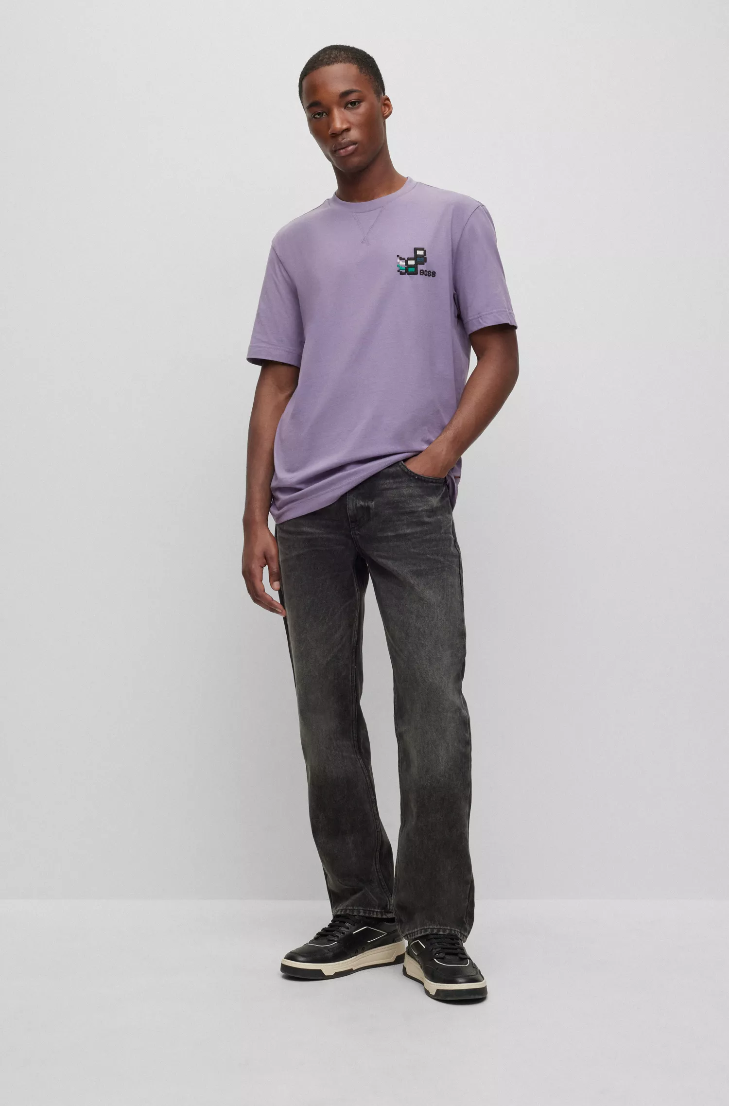 Camiseta BOSS laranja em malha de algodão com estampa sazonal.