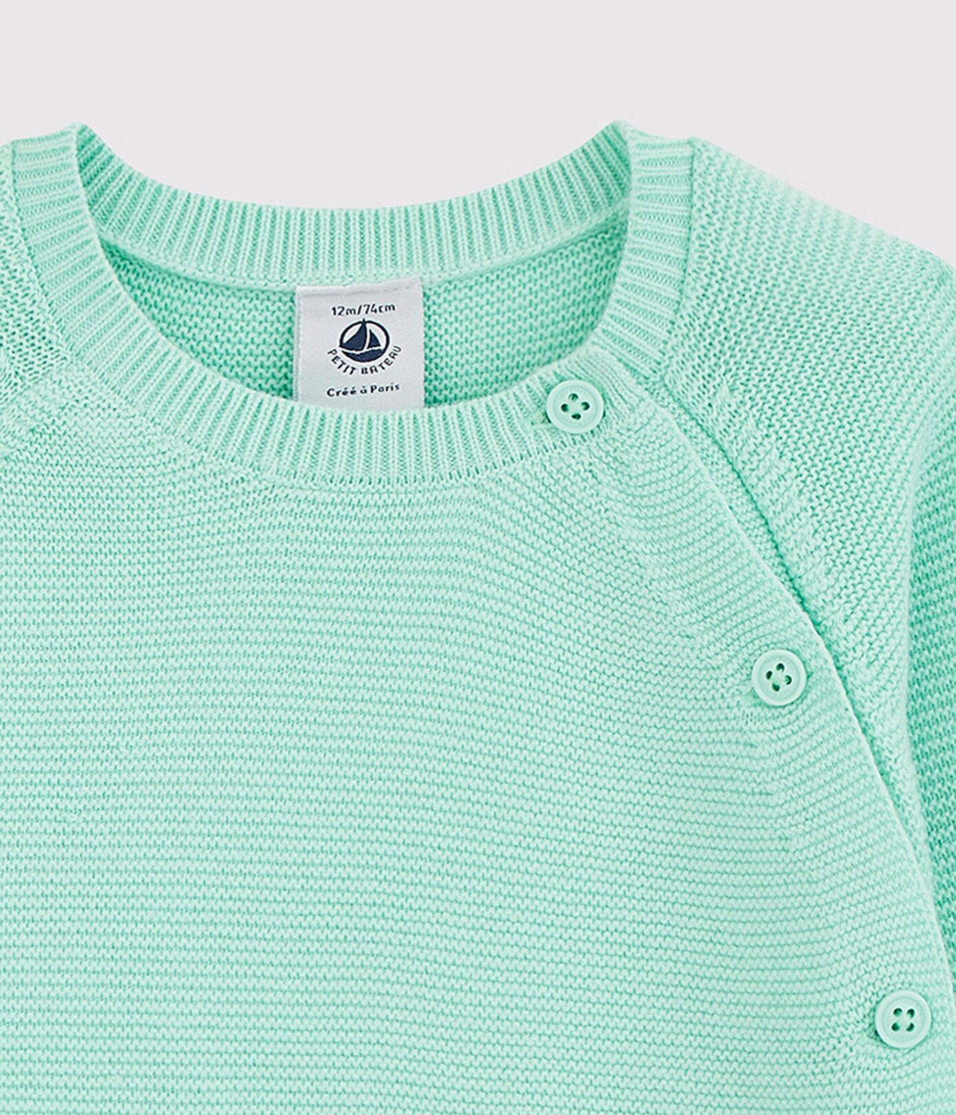 Cardigan bleu bébé en tricot de coton biologique