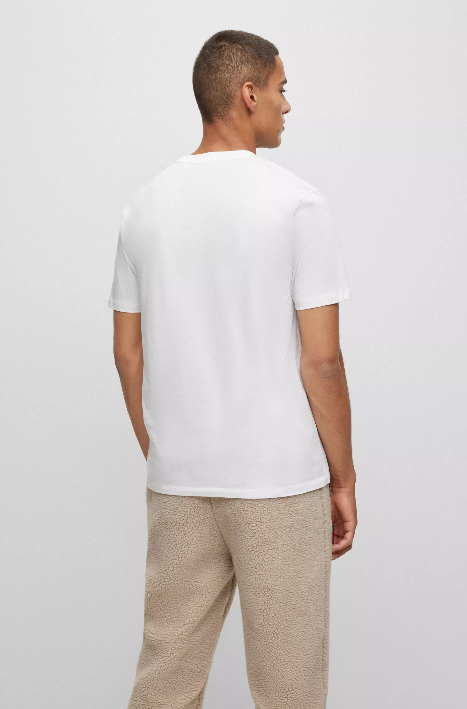 Camiseta HUGO vermelha em malha de algodão com estampa de dálmata e logo exclusivo.