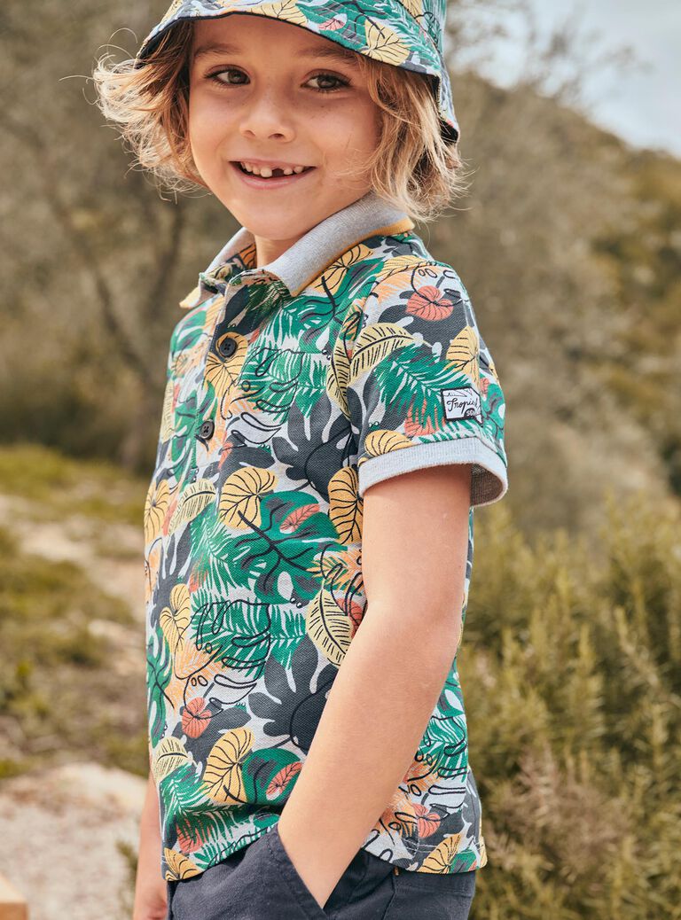 Polo gris à imprimé feuilles tropicales