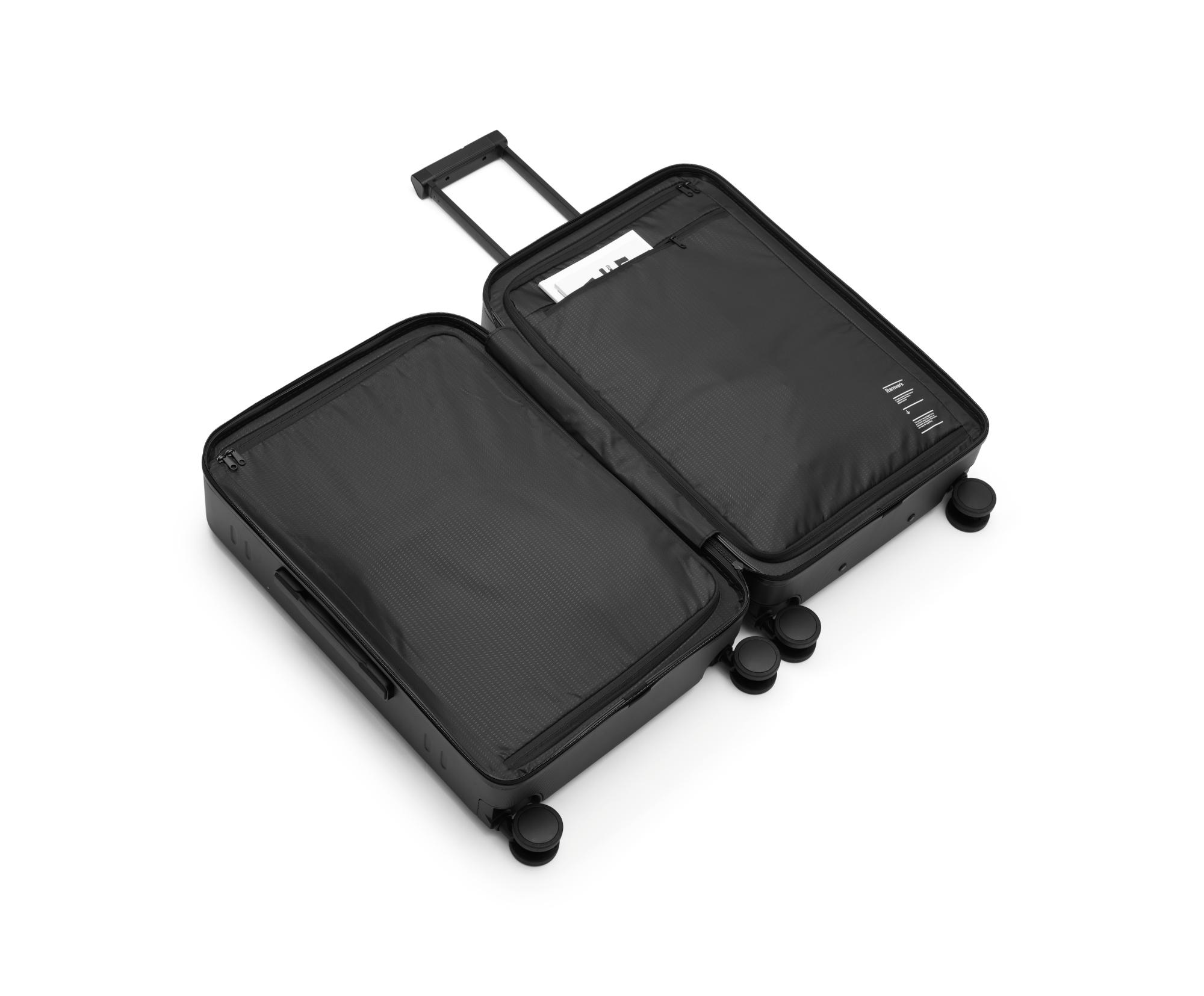 Db Ramverk Check-In Luggage Medium Black Out