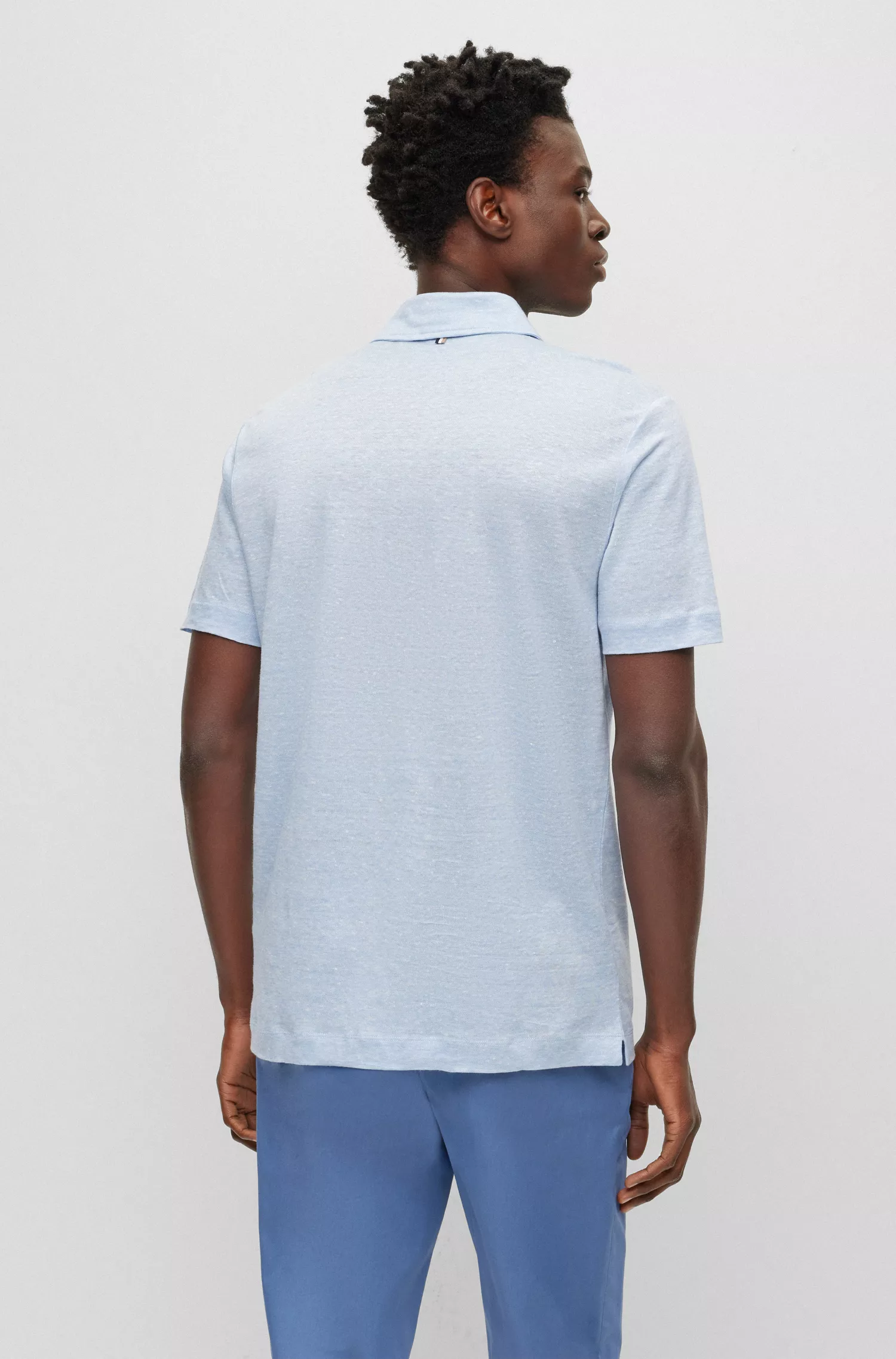 Camisa polo BOSS preta, corte regular, em linho bicolor.