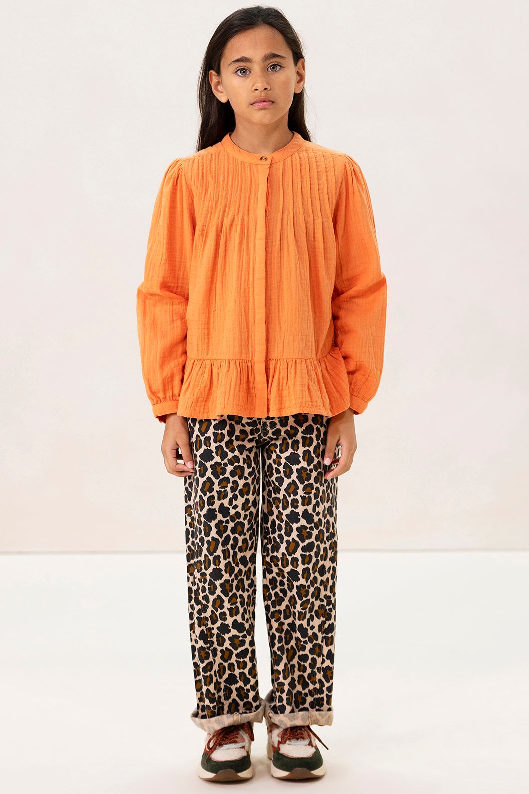 Oranje blouse met pintuck details