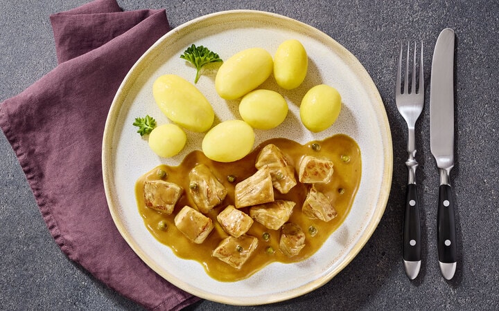 Schweinefleisch in Pfefferrahmsoße (20553) | online bestellen!