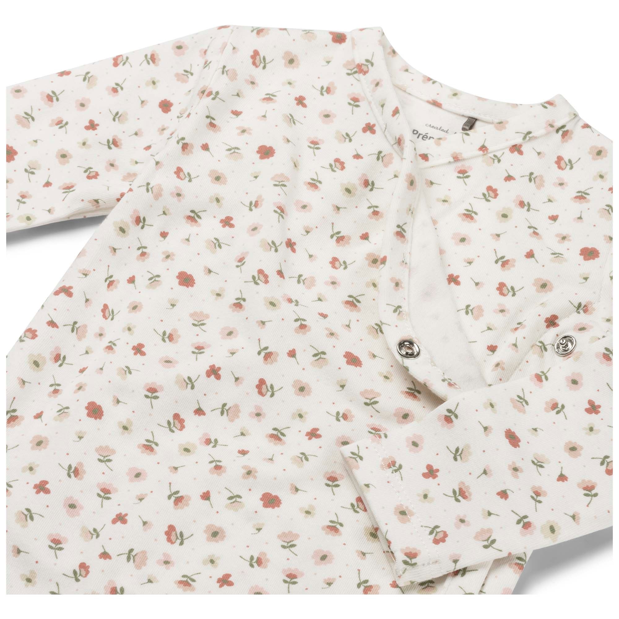 Prénatal newborn romper lange mouwen all over print roze